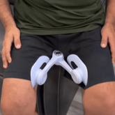 Man using the PelFit Control Trainer while seated